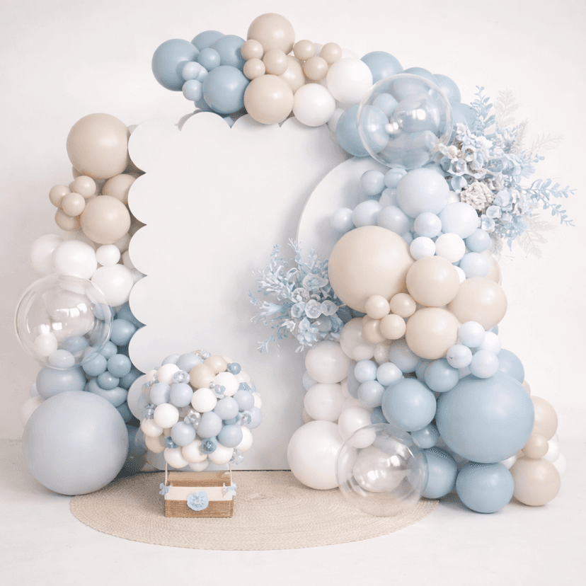 Blue and beige birthday setup with flowers